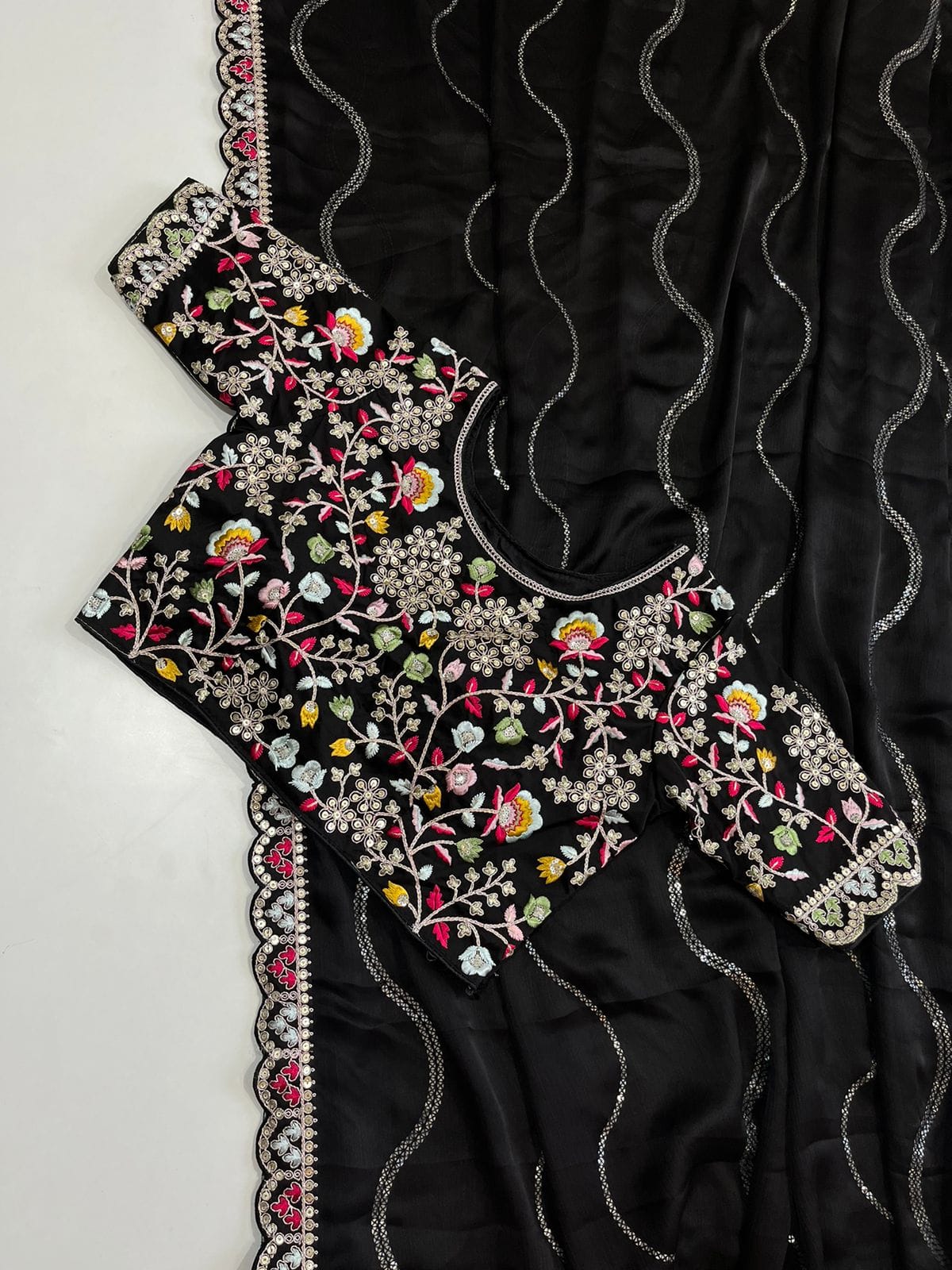 Blooming Black Georgette Crush Saree