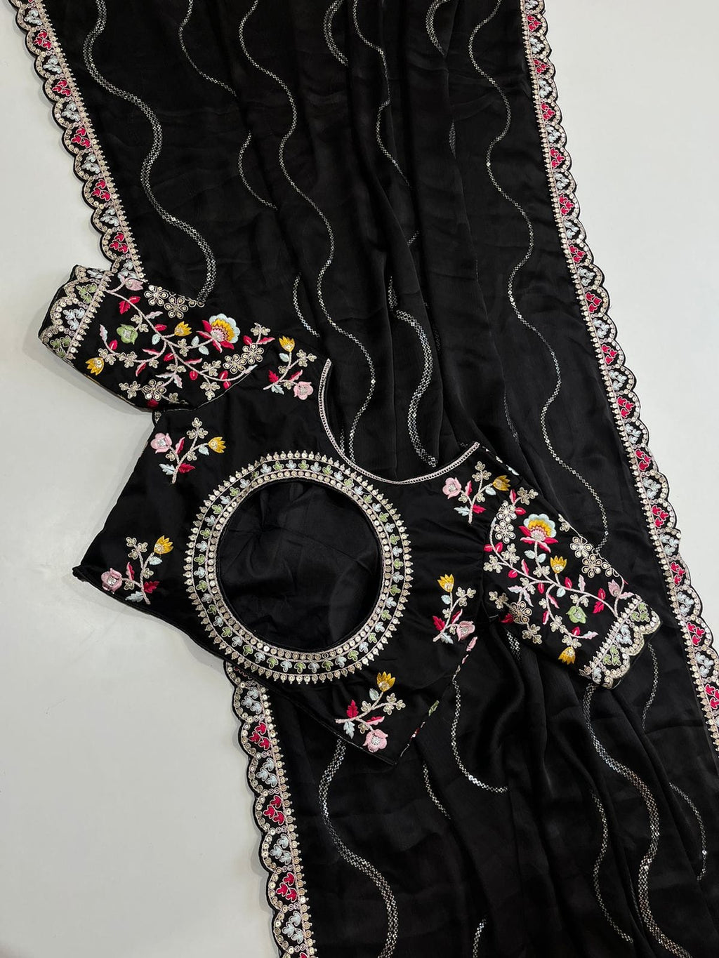 Blooming Black Georgette Crush Saree