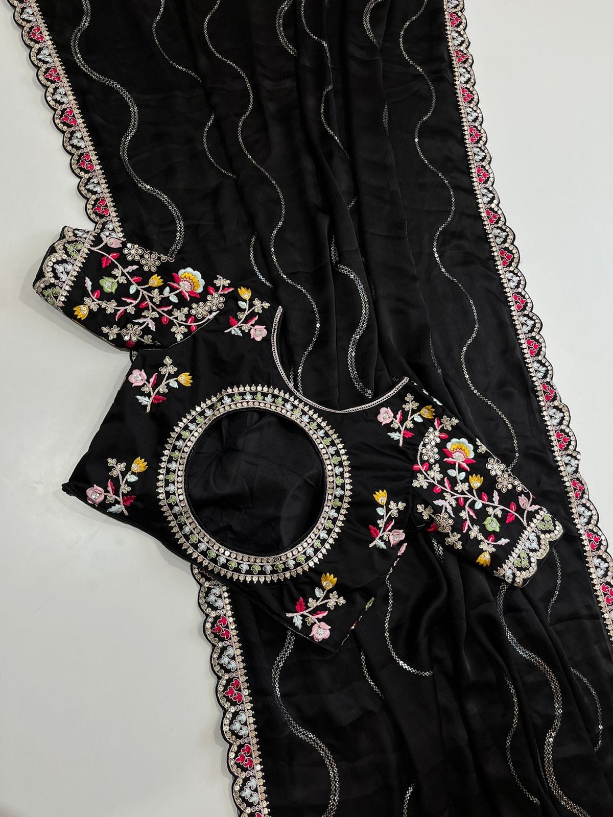 Blooming Black Georgette Crush Saree
